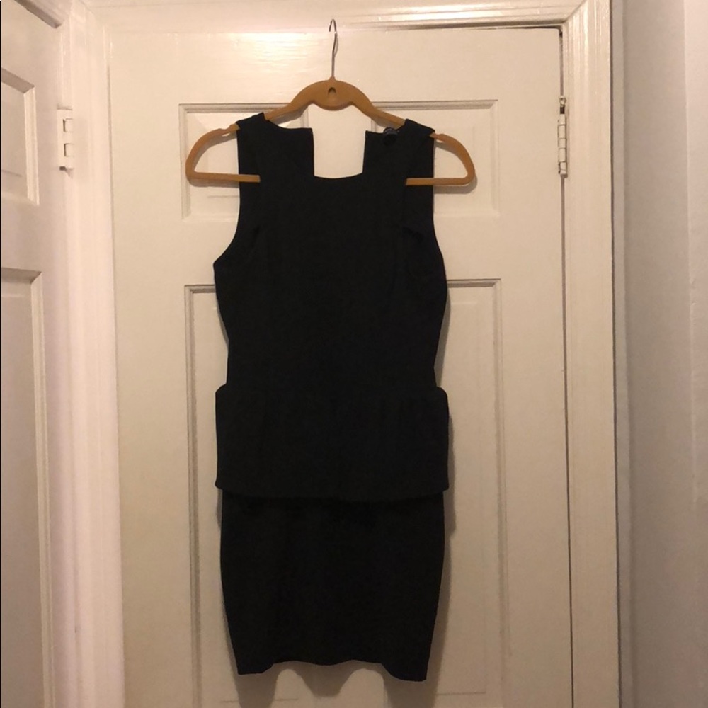 Bebe size two black peplum dress